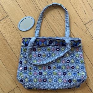 Moyna mirrored purse.